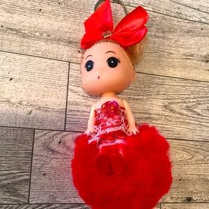red doll key chain